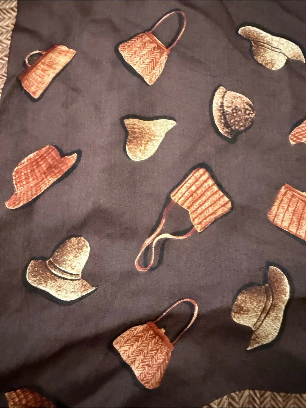 Brown Decorative Throw with Orange Hat & Bag Motif